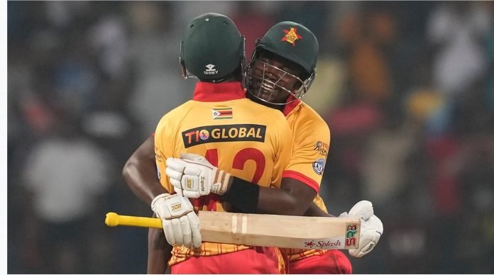 Luke Jongwe and Clive Madande celebratee after guiding Zimbabwe to a historic win against Sri Lanka in Colombo